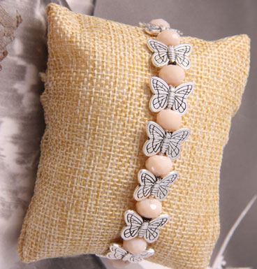 Bracelets Butterfly kisses and peach crystals